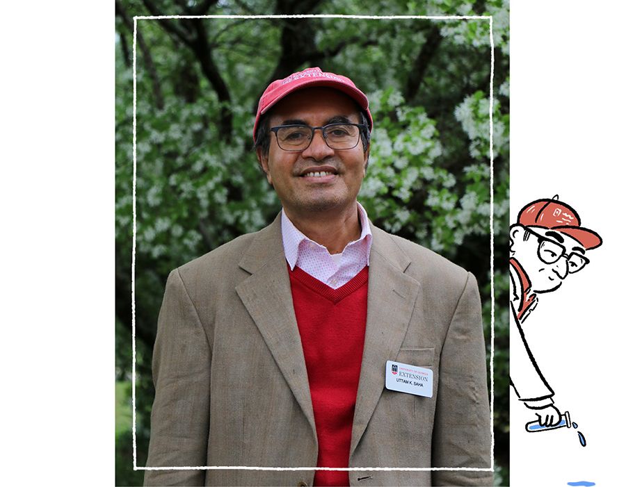 Portrait of a man in a tan coat and name tag, wearing a red UGA Extension ball cap. Adjacent to this image is a caricature of him pouring out a test tube of water.