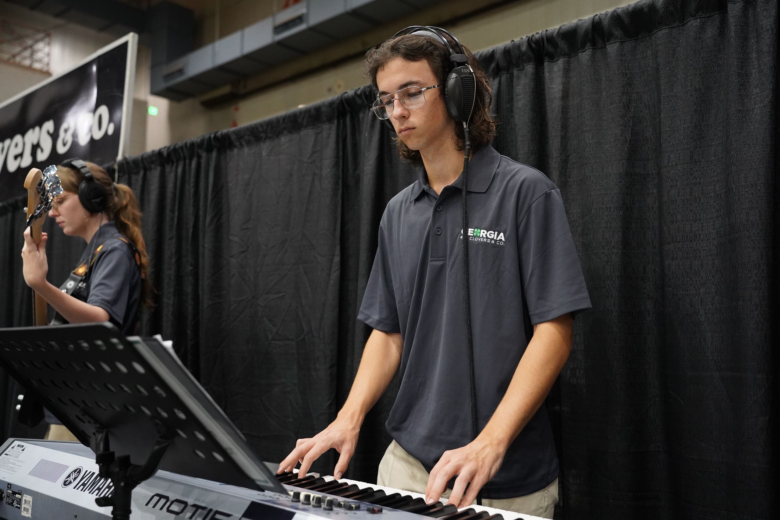 A young man performs with Clovers and Co. at the Georgia National Fair. 