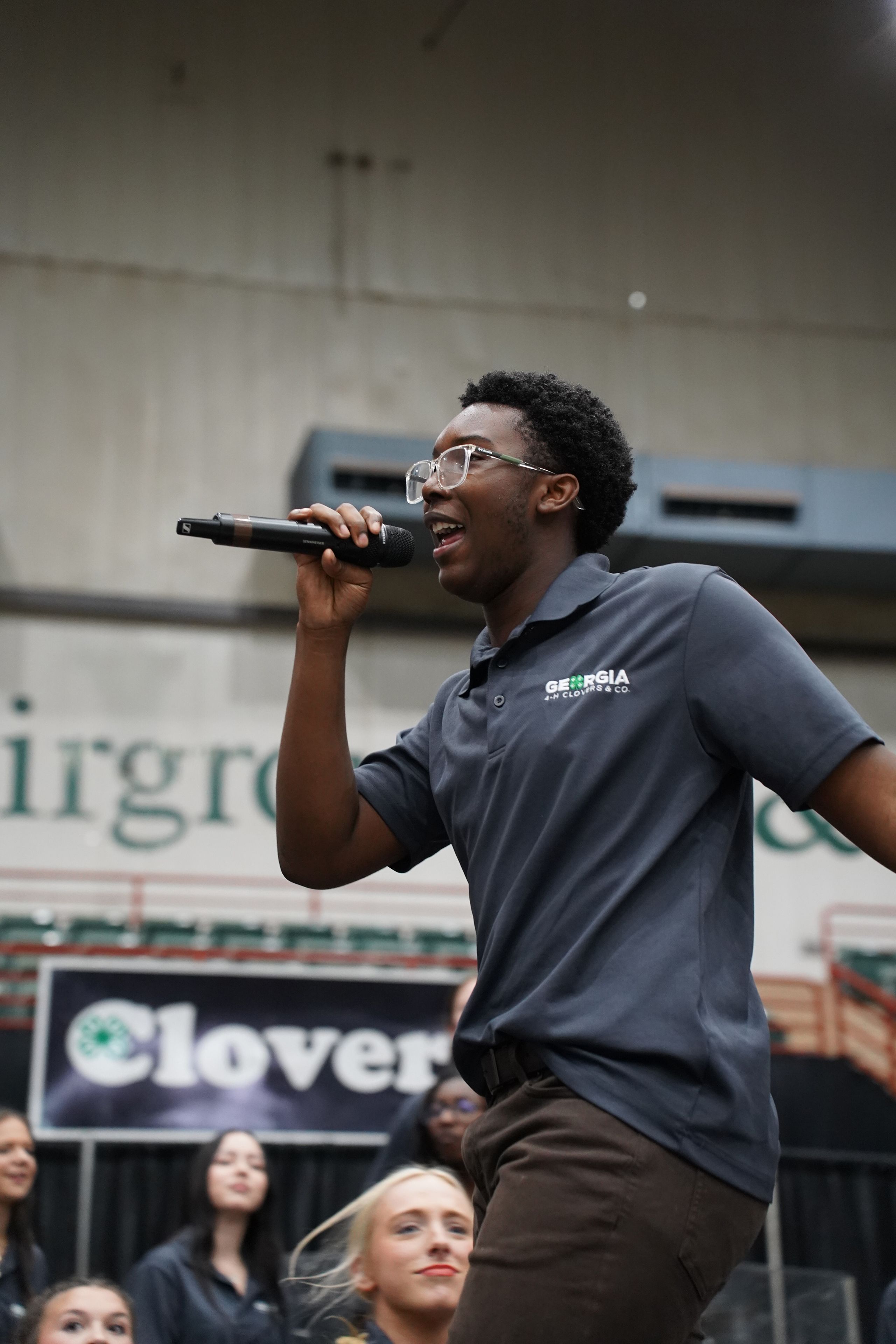 A singer performs with Clovers and Co. at the Georgia National Fair. 