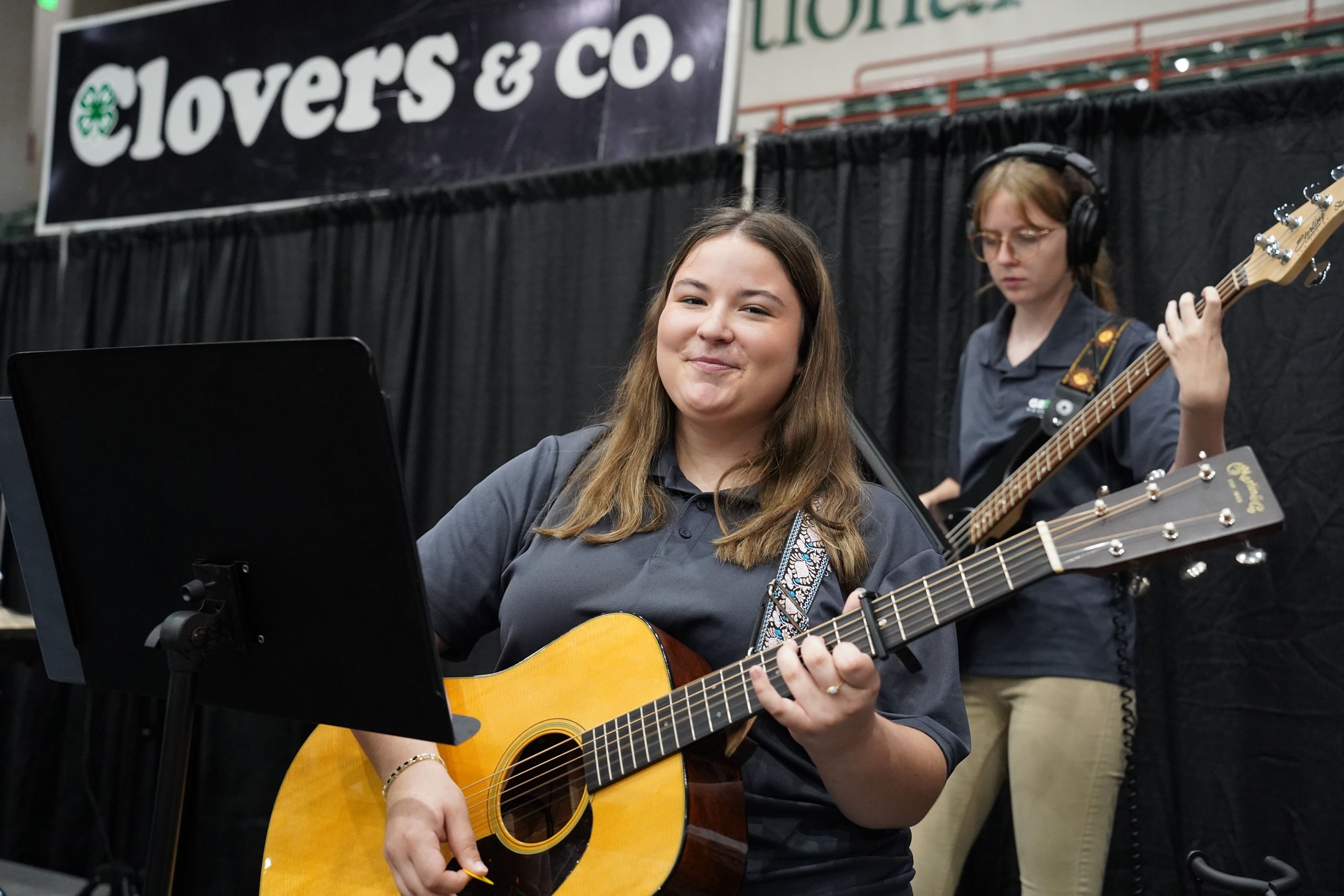 A guitarist performs with Clovers and Co. at the Georgia National Fair. 