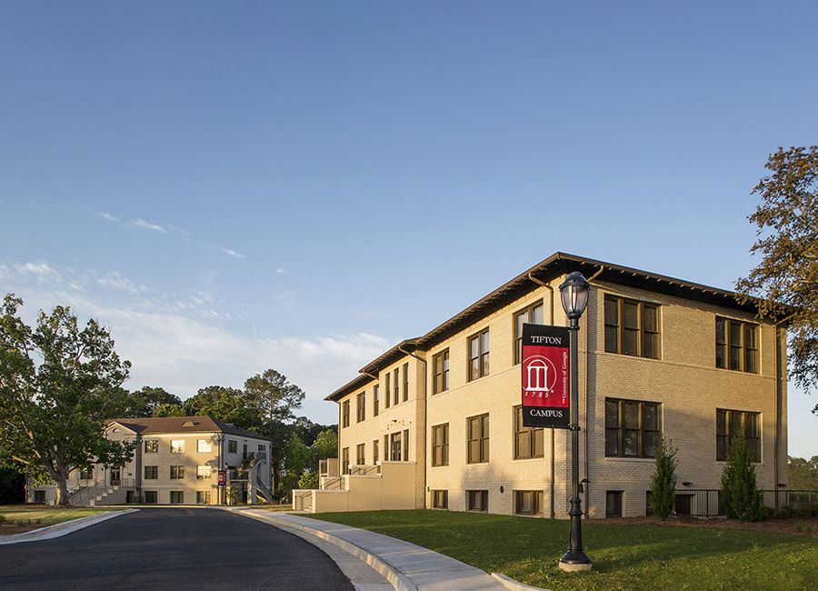 A photo of off-white brick buildings on the UGA Tifton campus. 